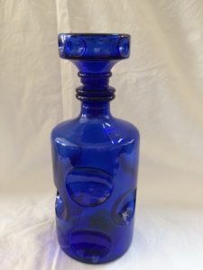 Blue decorative bottle with glass stopper