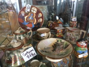 Cabinet of assorted Satuma ceramics