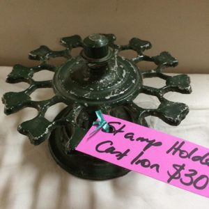 Vintage cast iron stamp holder